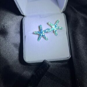 Rhinestone starfish blue stud earrings.